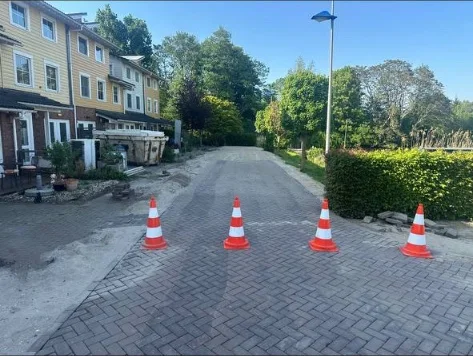 Herbestrating van een woonstraat door T.LAAN Bestrating